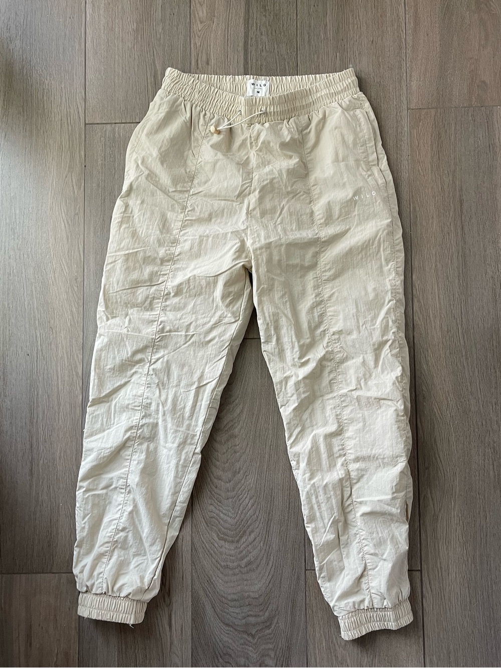 Women’s Cream Jogger Pants with Elastic Waist and Cuffed Ankles